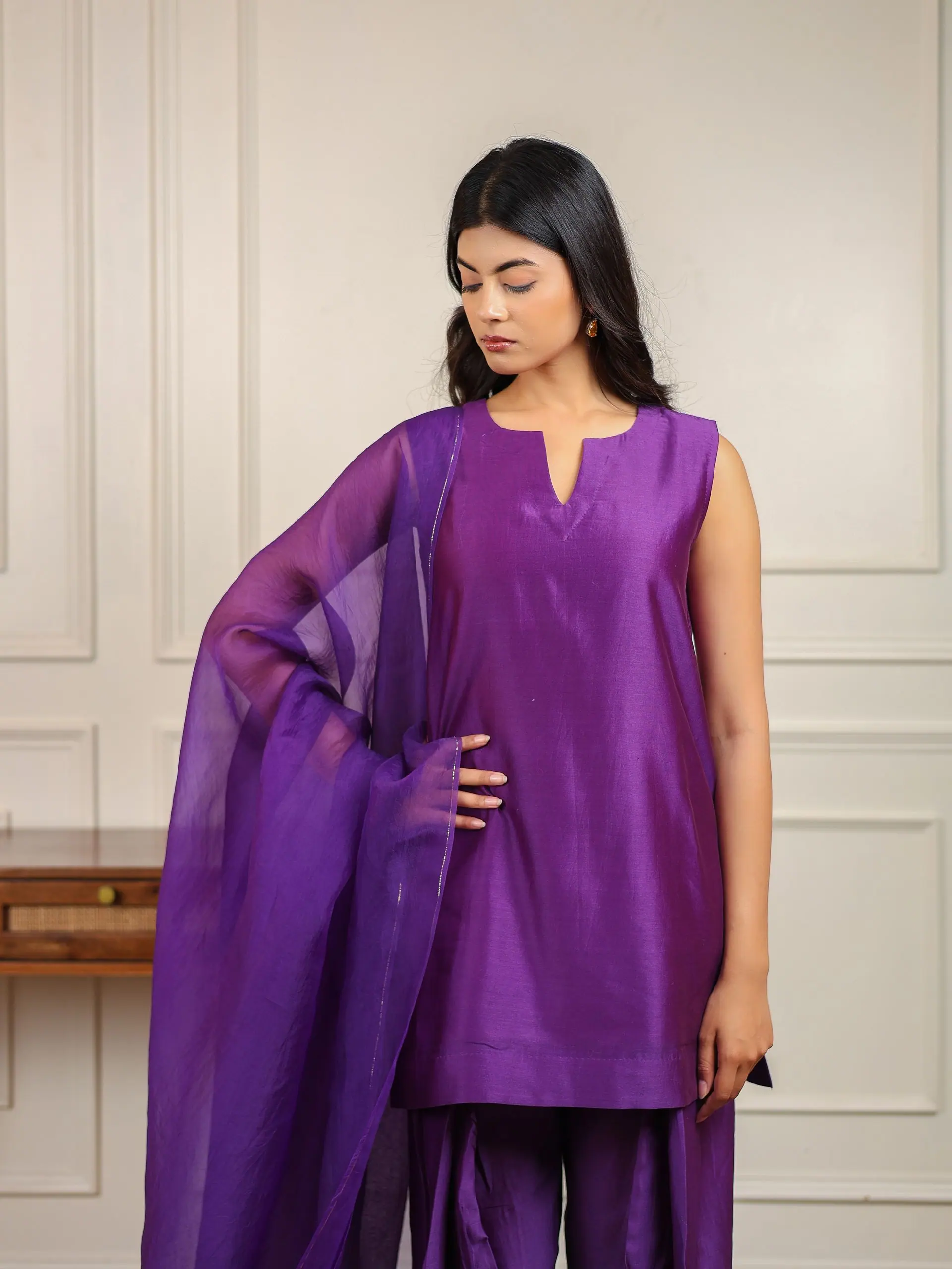 Aubergine kurta with dupatta over the shoulder